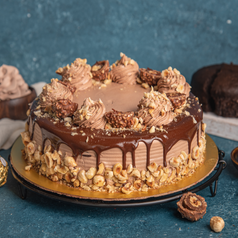 Ferrero Rocher Cake with Meringue Layers and Nutella Frosting